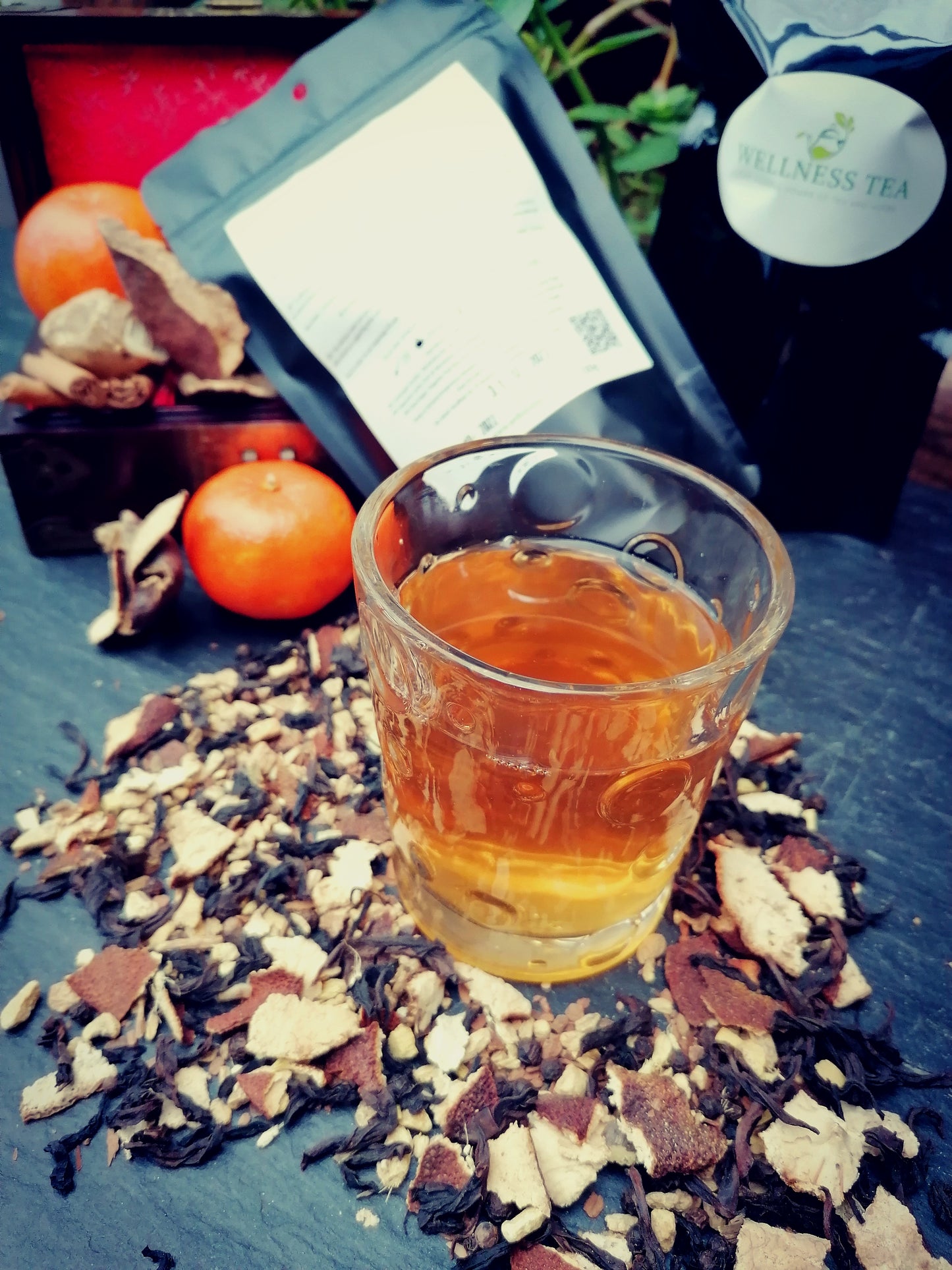 Hot and Spicy Tea  liquor in Glass and Package